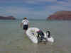 Caleta_Partida_-_Jan_dragging_dinghy (60K)