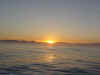 Sunrise over Carmel from seaward (39K)
